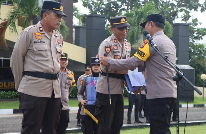 Kapolres Kuansing Pimpin Upacara Pelepasan Purna Bhakti Anggota