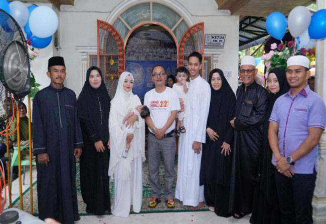 Pj Bupati Kampar Hadiri Tasyakuran Aqiqah Cucu Yurmailis Saruji