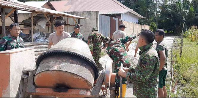 TMMD 114 Kodim 0301/PBR Lanjutkan Semenisasi Jalan Bunga Tombak dan Pembangunan RLH