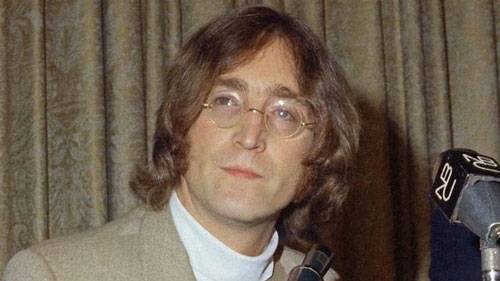 Surat John Lennon Berisi Kemarahan pada Paul McCartney Dilelang Rp489 Juta John Lennon (AP Files)