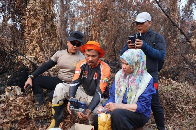 Plh Bupati Yuliantini Tinjau Normalisasi Parit 18