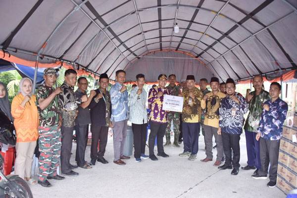 Baznas Bengkalis Salurkan 1 Ton Beras Ke Tujuh Desa Terdampak Banjir di Bantan