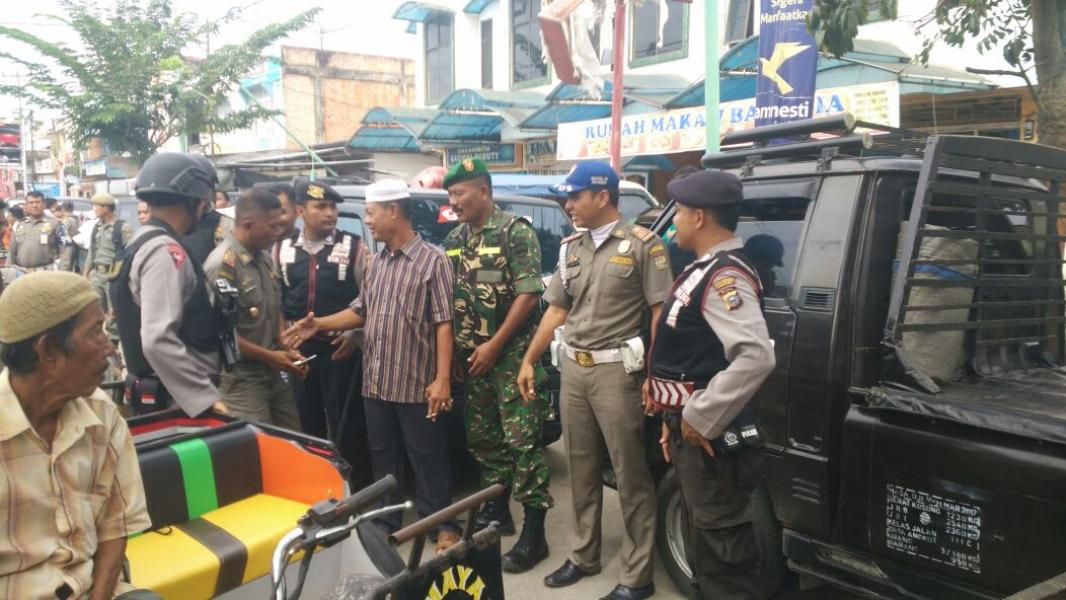 Jelang Pilkada, Personil Polres Kampar Giatkan Patroli Gabungan Bersama Brimob dan Unsur TNI