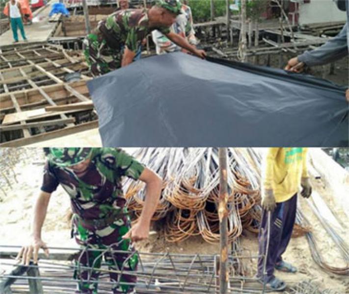 Babinsa Koramil 08/Mandah bersama Warga Desa Belaras Rehab Jalan Pelantar yang Rusak 