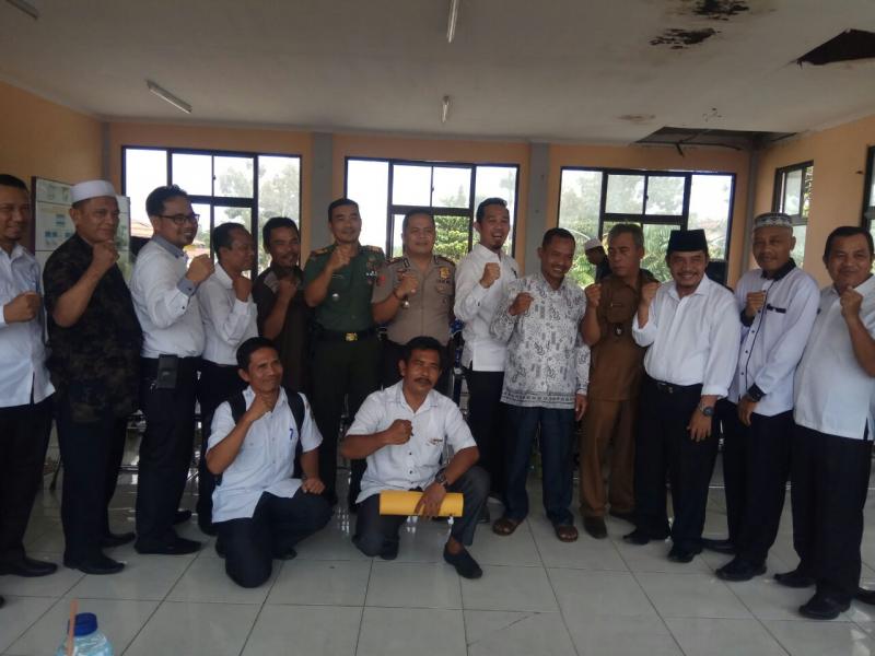 Danramil 16/Tapung Hadiri Acara Sertijab Kades