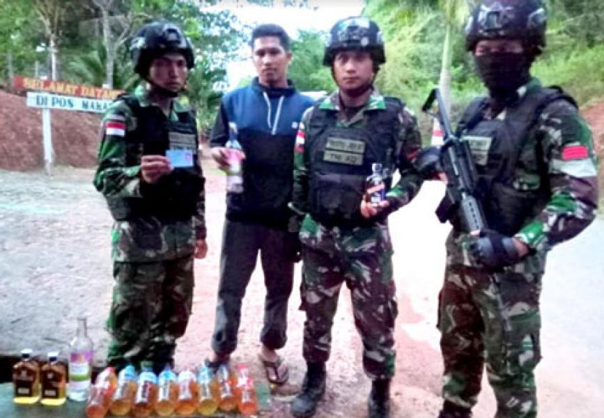 Gelar Pemeriksaan, 14 Botol Miras Kembali Diamankan Pos Makadi Satgas Yonif 411 Kostrad