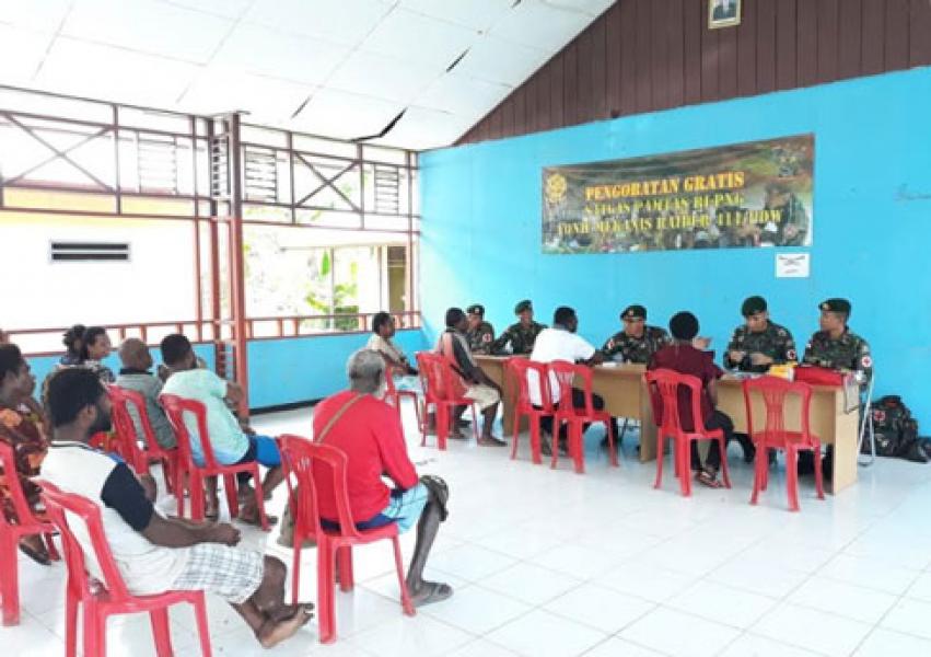 Peduli Kesehatan Warga Papua, Satgas Yonif MR 411/Pdw Kostrad Gelar Pengobatan Gratis