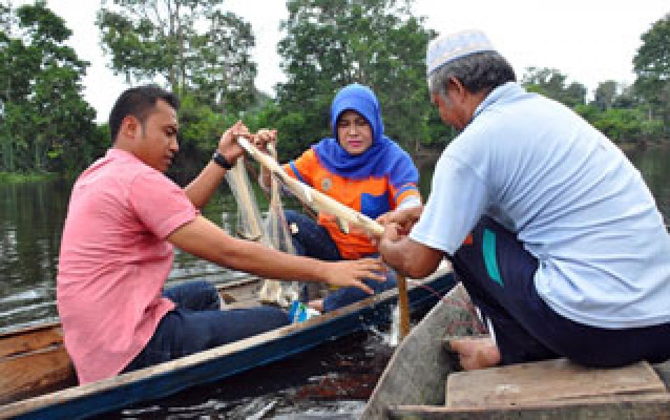Peresmian Danau Baru Desa Buluh Cina dan Panen Raya Ikan
