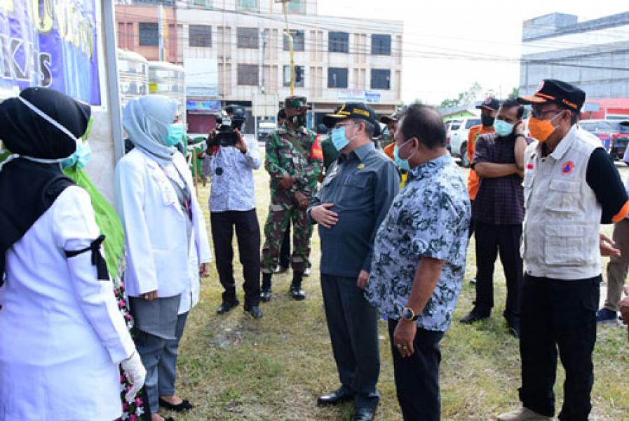 Penumpang Wajib Turun dan Diperiksa di Posko Penanganan Covid-19