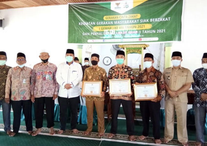 Alfedri Hadiri Gemar Berzakat VIII dan Penyaluran Zakat Tahap II di Kecamatan Sei Apit