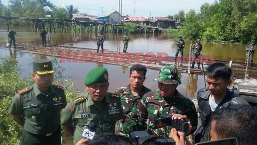 Kodim 0321 Rokan Hilir Amankan 30 Ton Kayu Illegal