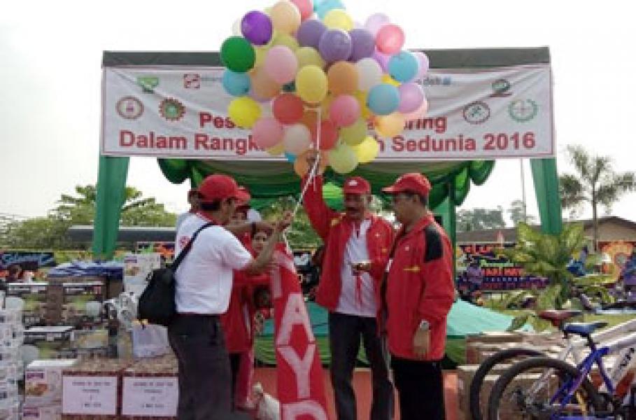 Ribuan Buruh Tualang Ikuti Gerak Jalan Santai Hari Buruh Sedunia 2016