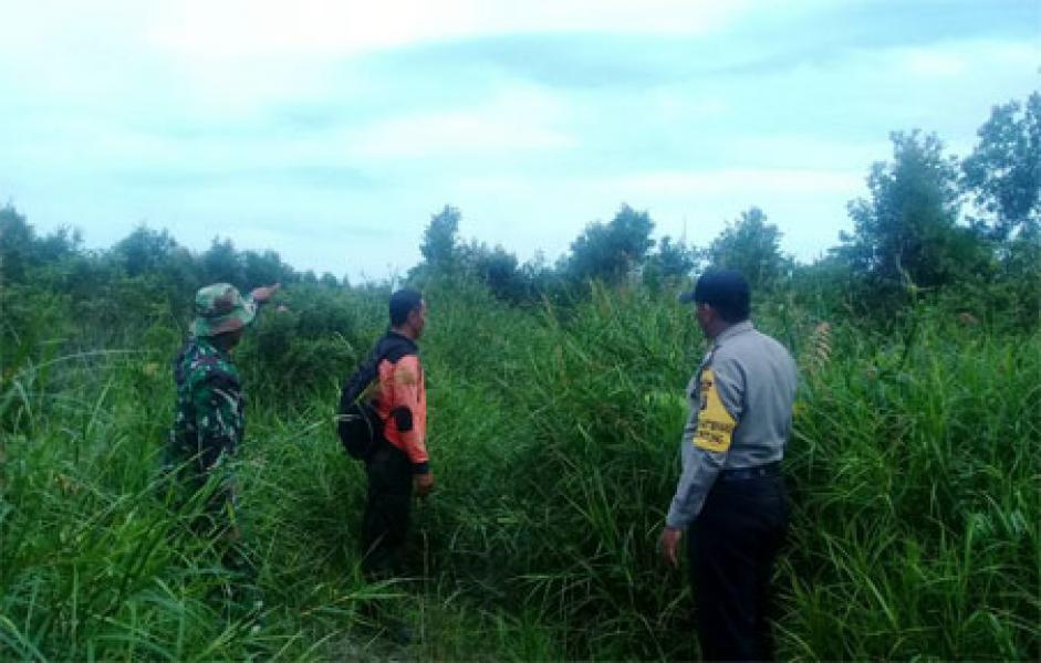 Memasuki Kemarau, Babinsa Koramil 02/Bukit Kapur Patroli Karlahut