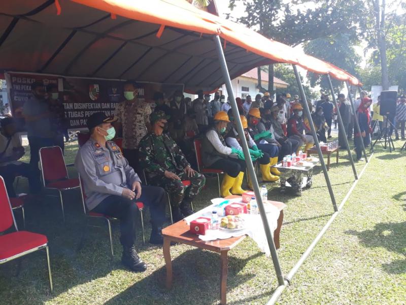 Antisipasi Covid-19, Polsek Tenayan Raya dan Forkopimda Pekanbaru Lakukan Penyemprotan Disinfektan dan Rapid Tes
