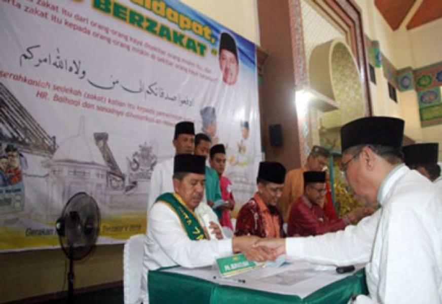 Plt Bupati Alfedri Bayar Zakat Lewat Baznas Siak