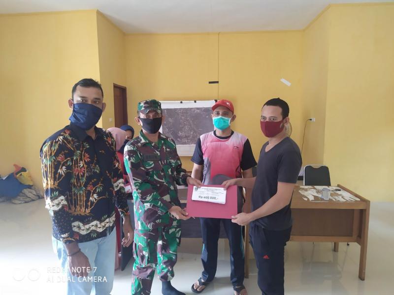 Babinsa Pantau Pembagian Dana BLT-DD Tahap II Desa Alahan.