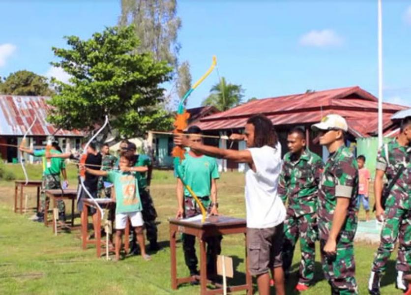 HUT Ke 56 Yonif 121/Macan Kumbang Gelar Pekan Olahraga Bersama Warga