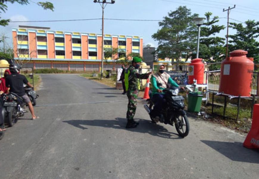 Cegah Penyebaran Covid 19, Babinsa Koramil 03/Siak Imbau Masyarakat Selalu Gunakan Masker