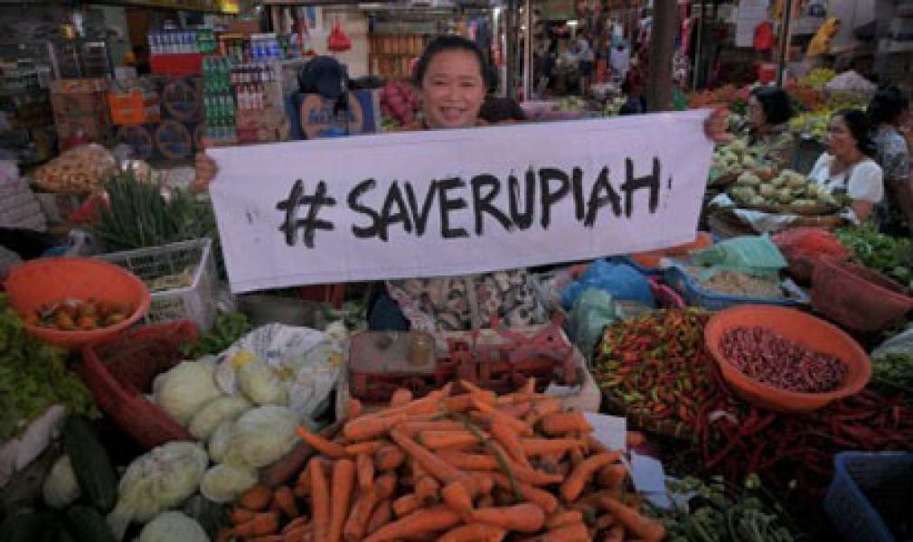Rupiah Sentuh Rp 14.100 per Dolar AS