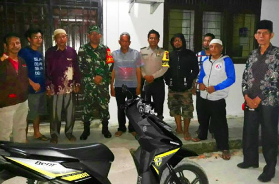 Ciptakan Kenyamanan, Bhabinkamtibmas dan Babinsa Koramil 14/Kepenuhan Gelar Razia Pekat