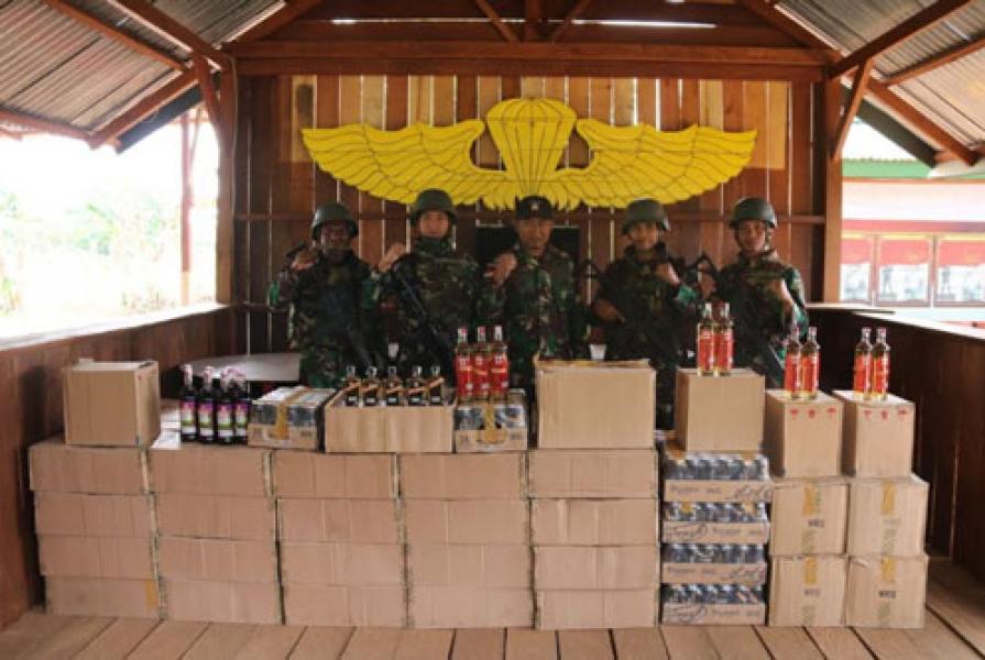 Prajurit TNI Pamtas RI-PNG Yonif 411/Pandawa Berhasil Amankan 3.333 Botol Miras Ilegal