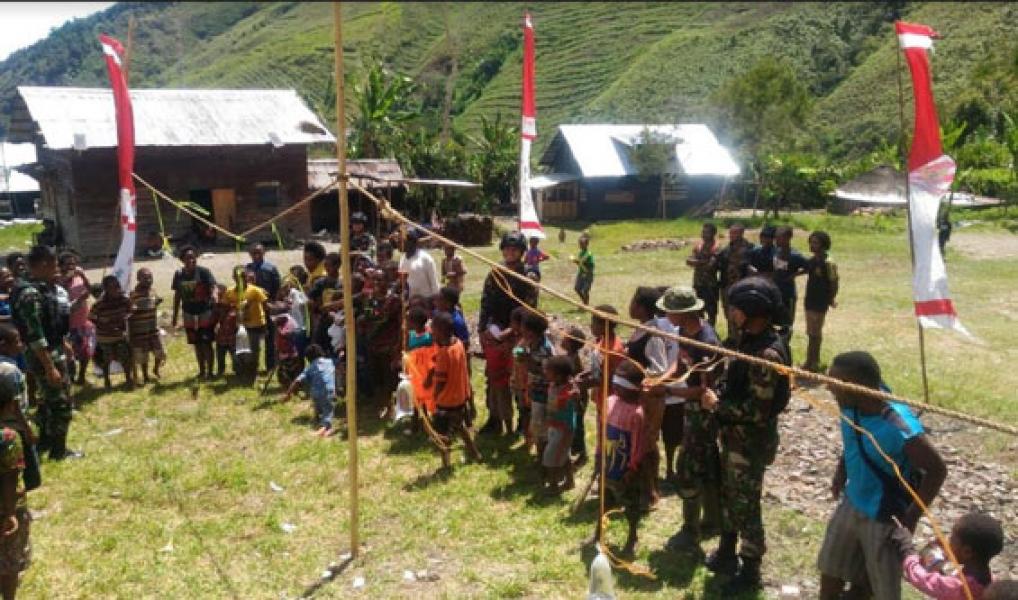 Satgas Yonif Raider 514/SY Gelar Perlombaan Anak-Anak Kampung Karubate
