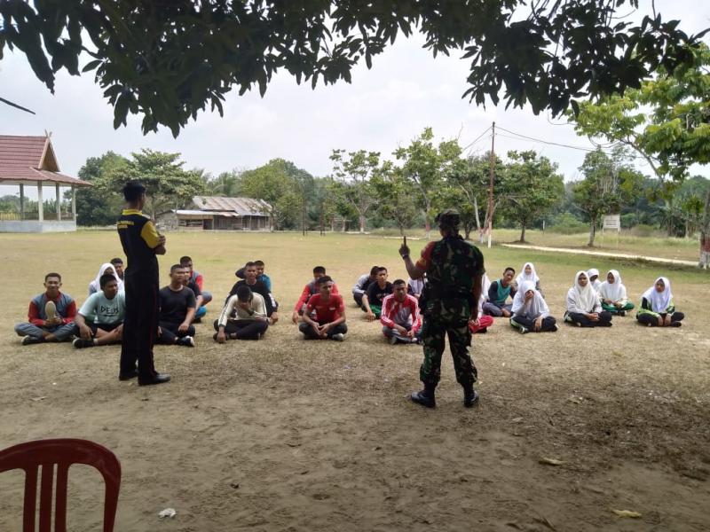 TMMD ke 105 Kodim 0313/KPR, Koramil 03/Bunut Laksanakan Kegiatan Wasbang Terhadap Siswa-Siswi SMNN Bandar Petalangan