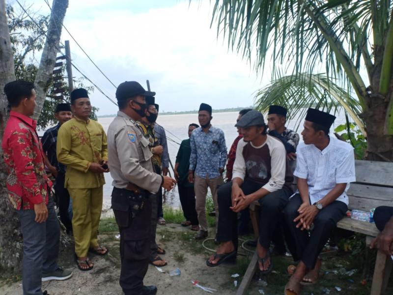 Cegah Covid-19, Bhabinkamtibmas Polsek Teluk Meranti Sampaikan Adaptasi Kebiasaam Baru