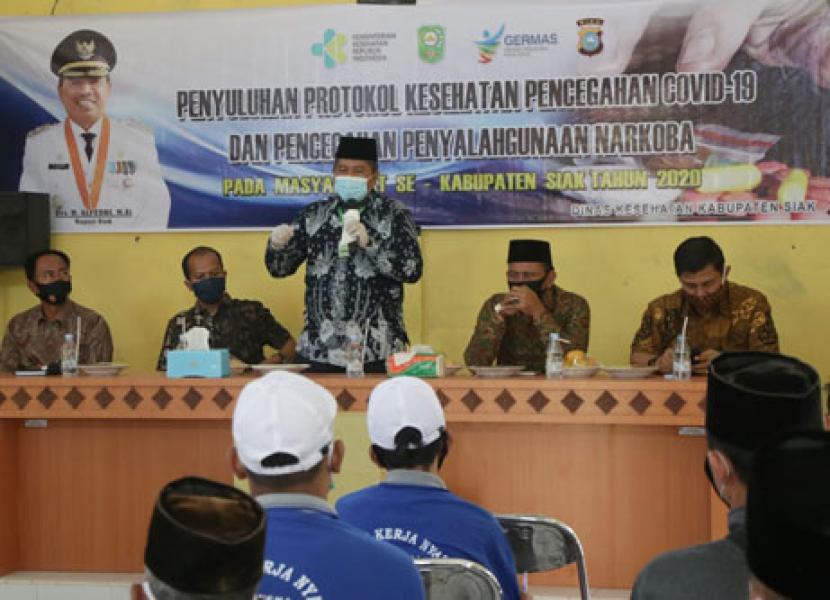Jadi Narsum Sosialisasi Bahaya Narkoba, Bupati Alfedri Juga Ingatkan Pentingnya Protokol Kesehatan  
