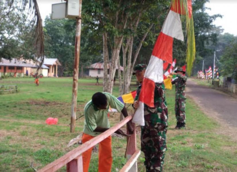 Jelang Peringatan HUT RI Ke-75, Prajurit Pamtas Yonif 125 Kerja Bakti Bersama Guru dan Siswa