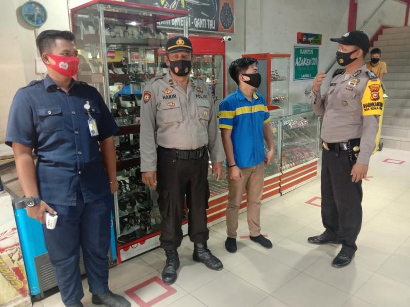 Polsek Pangkalan Kerinci Sosialisasi Adaptasi Kebiasaan Baru di Tempat-tempat Umum