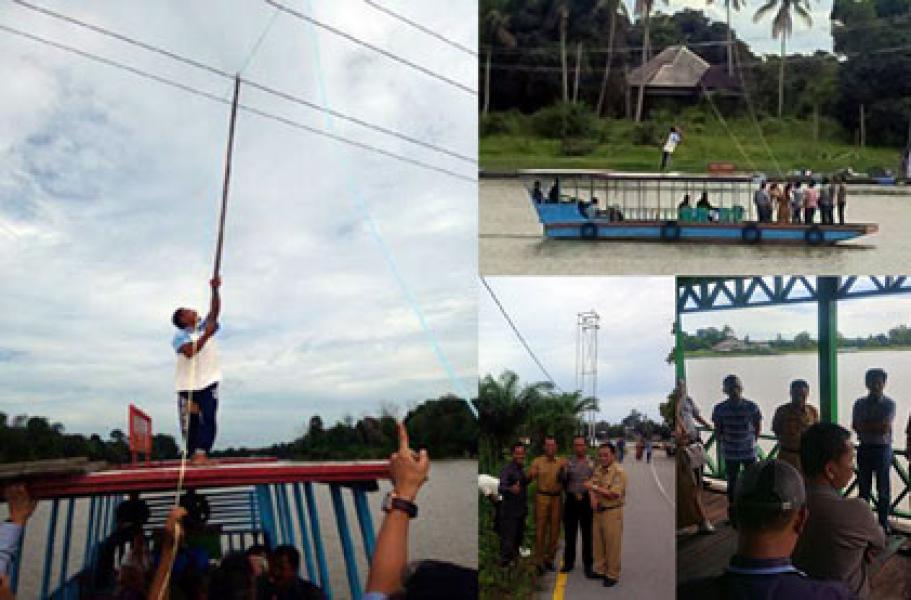 Ketinggian Jaringan Kabel Listrik Melintang Di Atas Sungai di Desa Kuala Terusan Sudah Standart, BUMD Tuah Sekata Segera ‎Aliri Arus Listrik