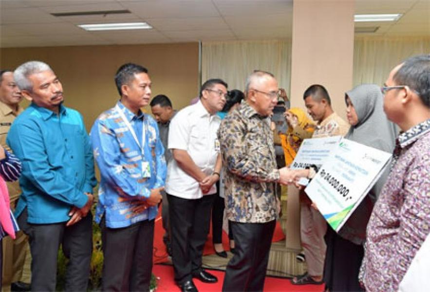 Bank Riau Kepri Bersama BPJS Ketenagakerjaan Serahkan Santunan Kepada Ahli Waris