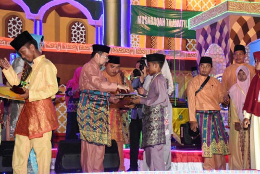 Muhammad Rinaldi dan Maulina Putri, Terbaik I Cabang Tilawah Golongan Anak-anak