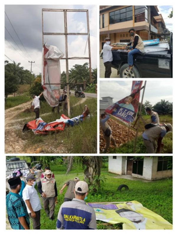 Bawaslu Tertibkan APK Paslon Pilkada Pelalawan