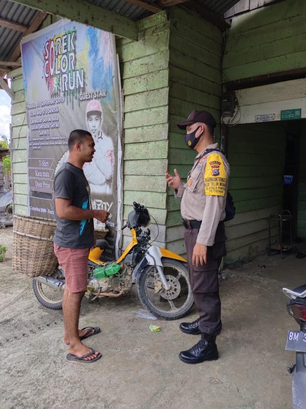 Covid-19 Belum Berakhir Bhabinkamtibmas Teluk Meranti Sosialisasi Adaptasi Kebiasaan Baru 