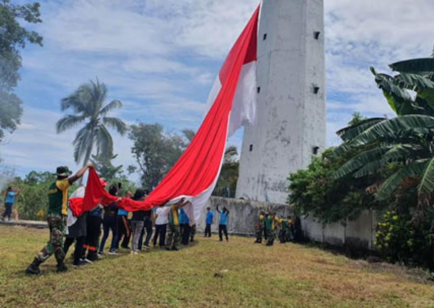 Peringati Hari Menara Suar, Satgas Yonif 413 Bremoro Gelar Karya Bhakti