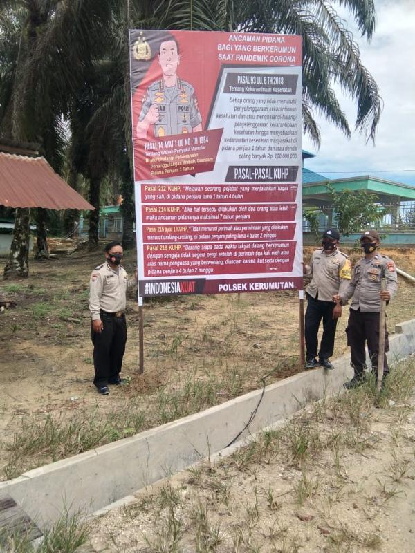 Polsek Kerumutan Pasang Puluhan Baleho, Aturan Sanksi Pidana Bagi Masyarakat Berkerumun Saat Pandemi Covid-19