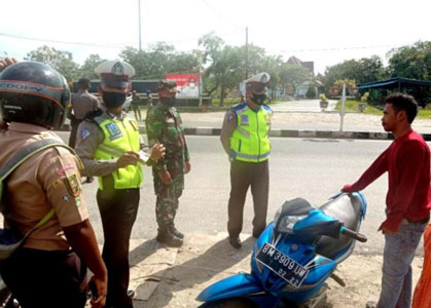 Tim Gabungan di Rohul Gelar Razia Masker