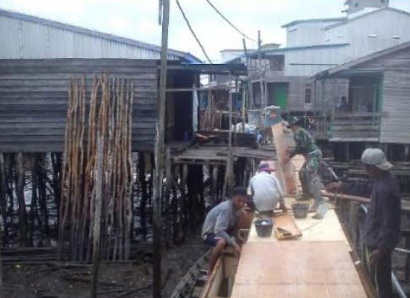 Babinsa Koramil 08/Mandah Goro Jalan Pelantar Kelurahan Mandah