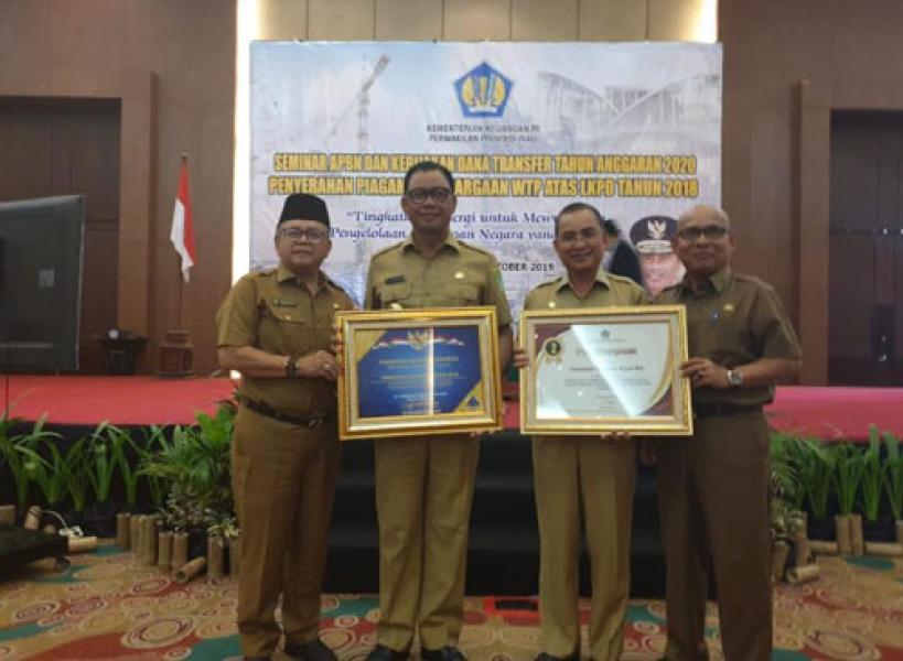 Bupati Suyatno Hadiri Seminar APBN dan Terima Penghargaan WTP Tahun 2018