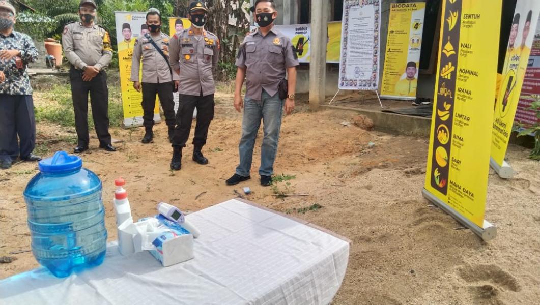 Kapolsek Ukui Pimpin Pengamanan Kampanye Calon Bupati Dan Wakil Bupati di Desa Kampung Baru