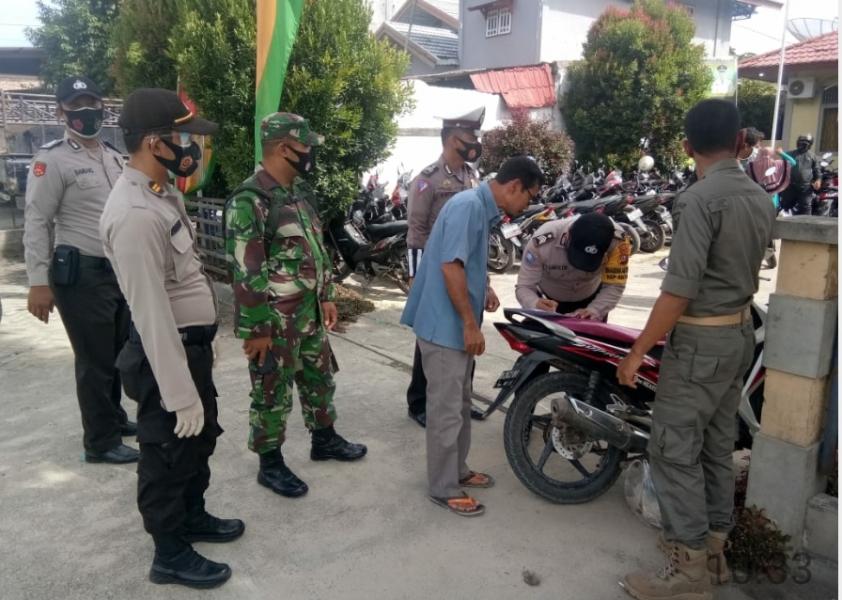 Masih Banyak Warga yang Bandel, Kapolsek Tanah Putih Minta Patuhi Protokol Kesehatan