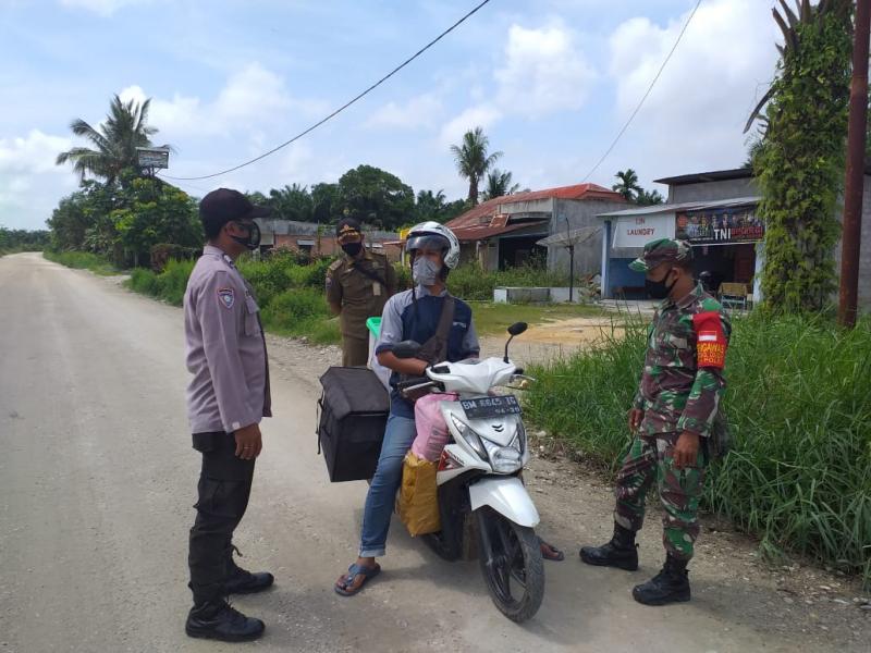 Polsubsektor Pelalawan, TNI dan Satpol PP Lakukan sosialisasi AKB