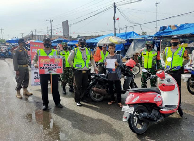 Satgas Pemburu Teking Tindak Pelanggar Protokol Covid-19 di Kecamatan Tualang
