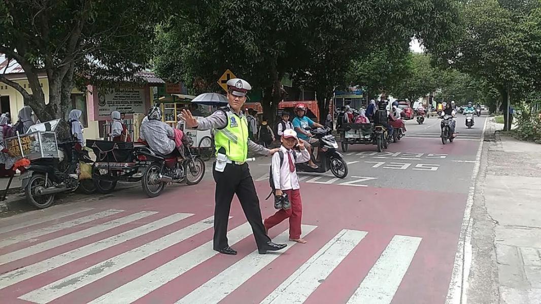 Cegah Macet dan Kejahatan Terhadap Anak, Sat Lantas Polres Kampar Laksanakan Pengaturan
