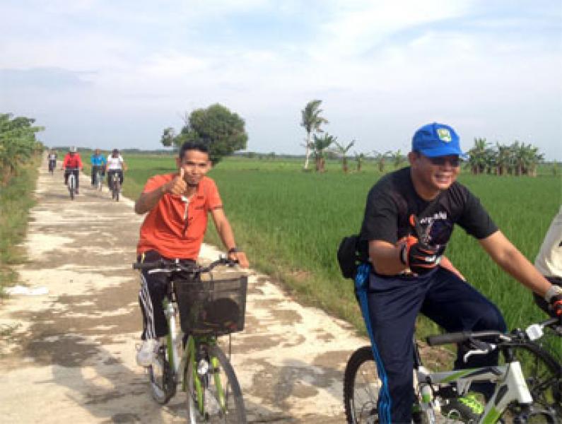 Babinsa Koramil 12/PWK Sabak Auh Ikuti Sepeda Santai Tour De Sawah