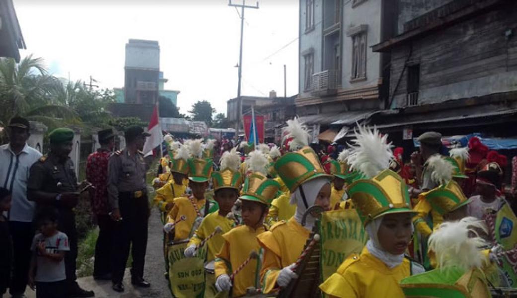 Memperingati Hari Pahlawan Koramil 07/Reteh Melaksanakan Pawai Dan Karnaval