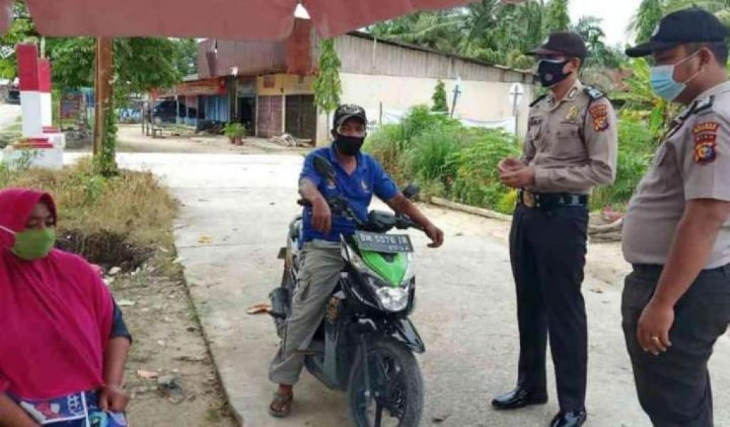 Ciptakan Lingkungan yang Sehat Terhindar dari Covid-19, Polsubsektor Pelalawan Giatkan Ops Yustisi