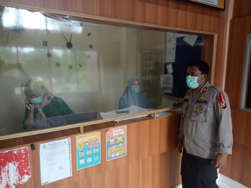 Kapolsek Bandar Sei Kijang Berkordinasi Dengan Puskesmas Terkait Perkembangan Covid-19 